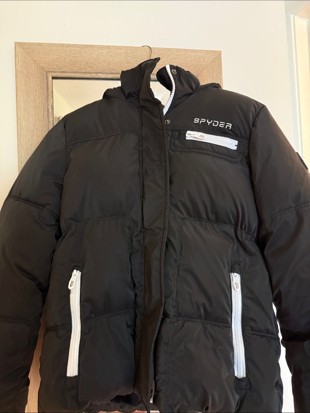 Spyder Black Puffer Jacket with White Zipper Accents